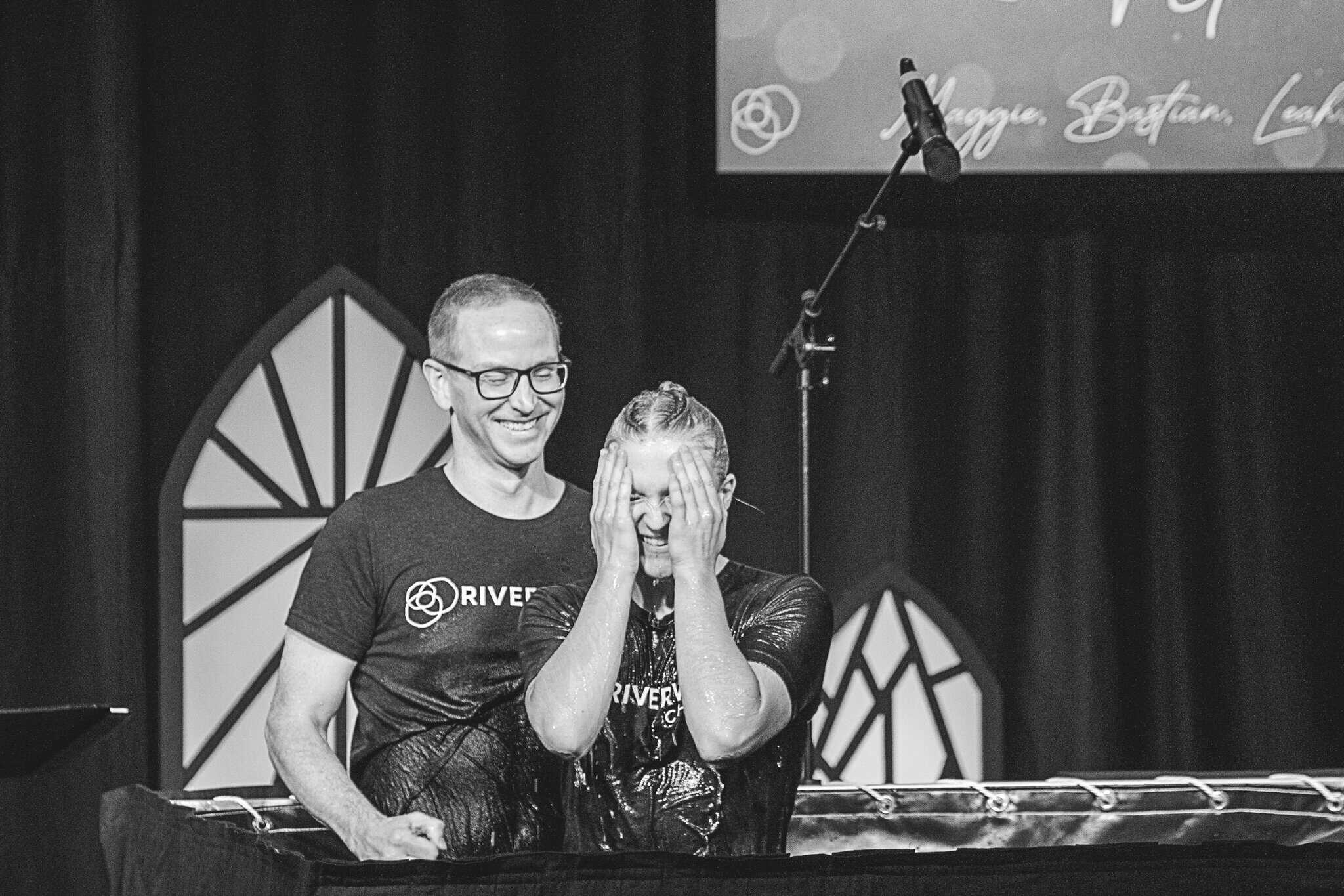 Pastor Erin Bird baptising Leah during a Sunday Worship Gathering at Riverwood Church